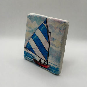 Coastal small boat artwork printed on square natural travertine stone coaster