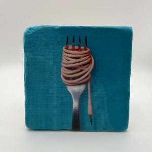 Spaghetti artwork printed on square travertine stone coaster