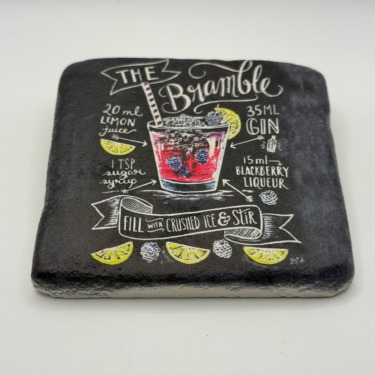 The Bramble artwork printed on square travertine stone coaster