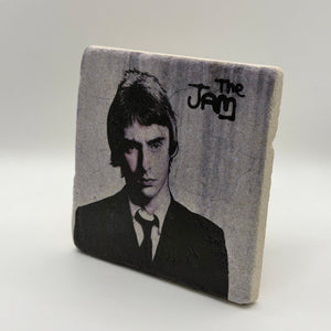 The Jam artwork printed on square travertine stone coaster