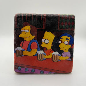 The Simpsons characters printed on square travertine stone coaster