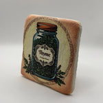 Thyme herb design printed on square travertine stone coaster