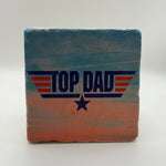 Funny 'Top Dad' quote printed on square natural travertine stone coaster