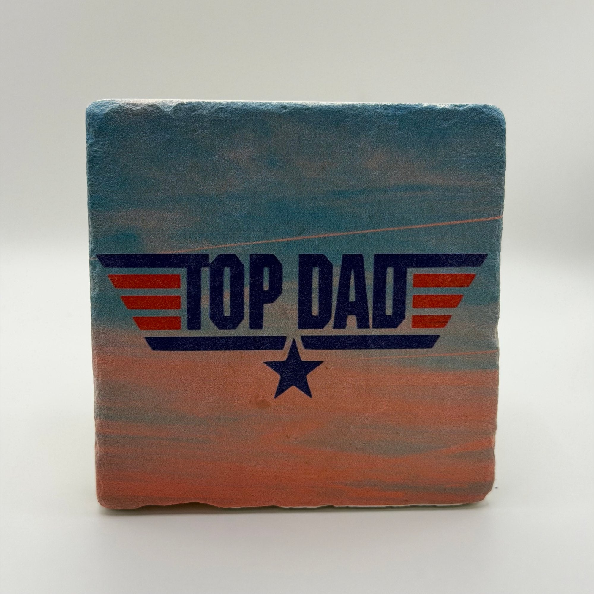 Funny 'Top Dad' quote printed on square natural travertine stone coaster