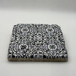Tribal artwork printed on square natural travertine stone coaster