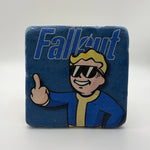 Fallout Vault Boy artwork featuring the middle finger gesture printed on square travertine stone coaster