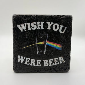 Funny 'Wish You Were Here' quote printed on square travertine stone coaster