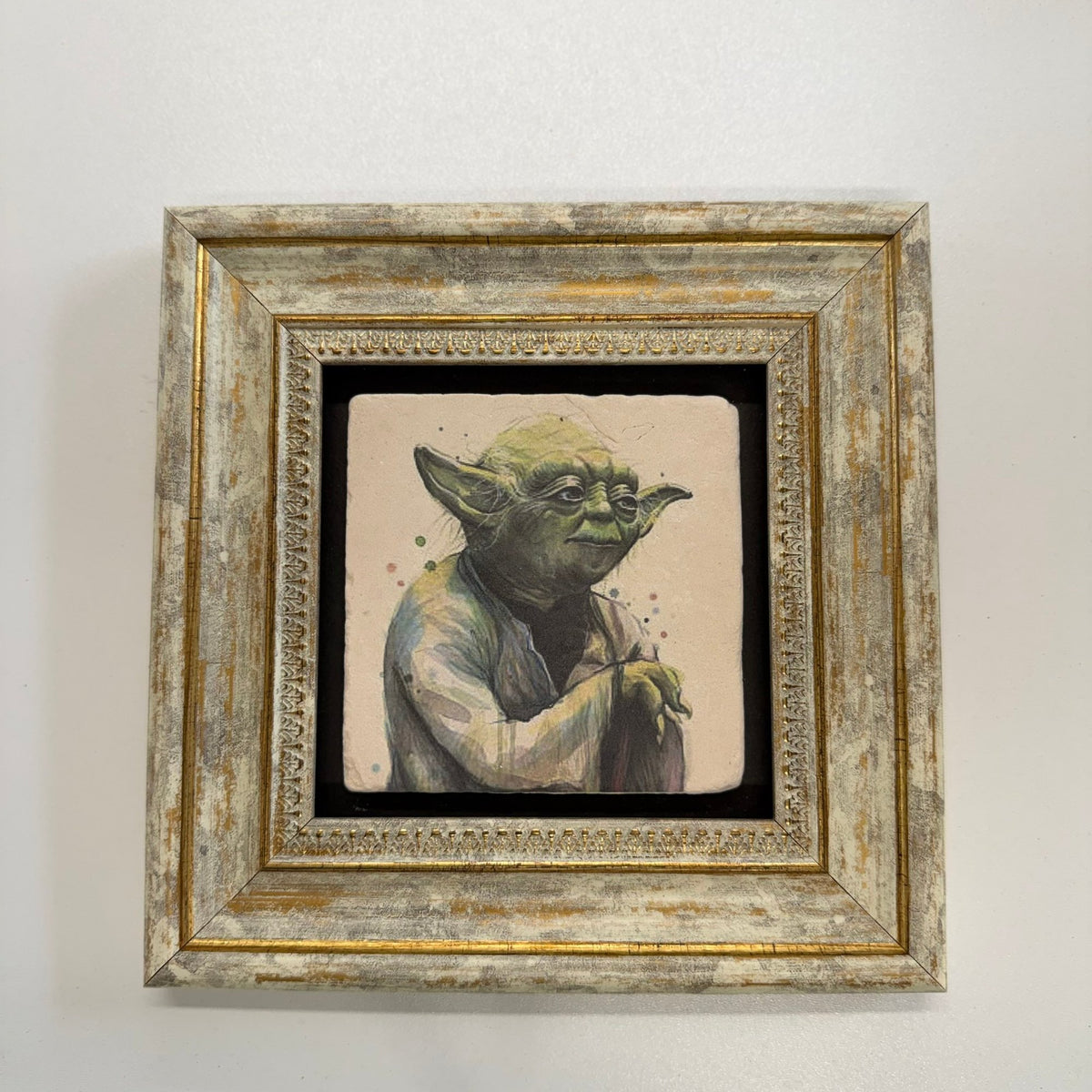Variant Mapping v4 | yoda-star-wars-natural-stone-coaster | with Gold Frame | sha256:ab7c6513bf62