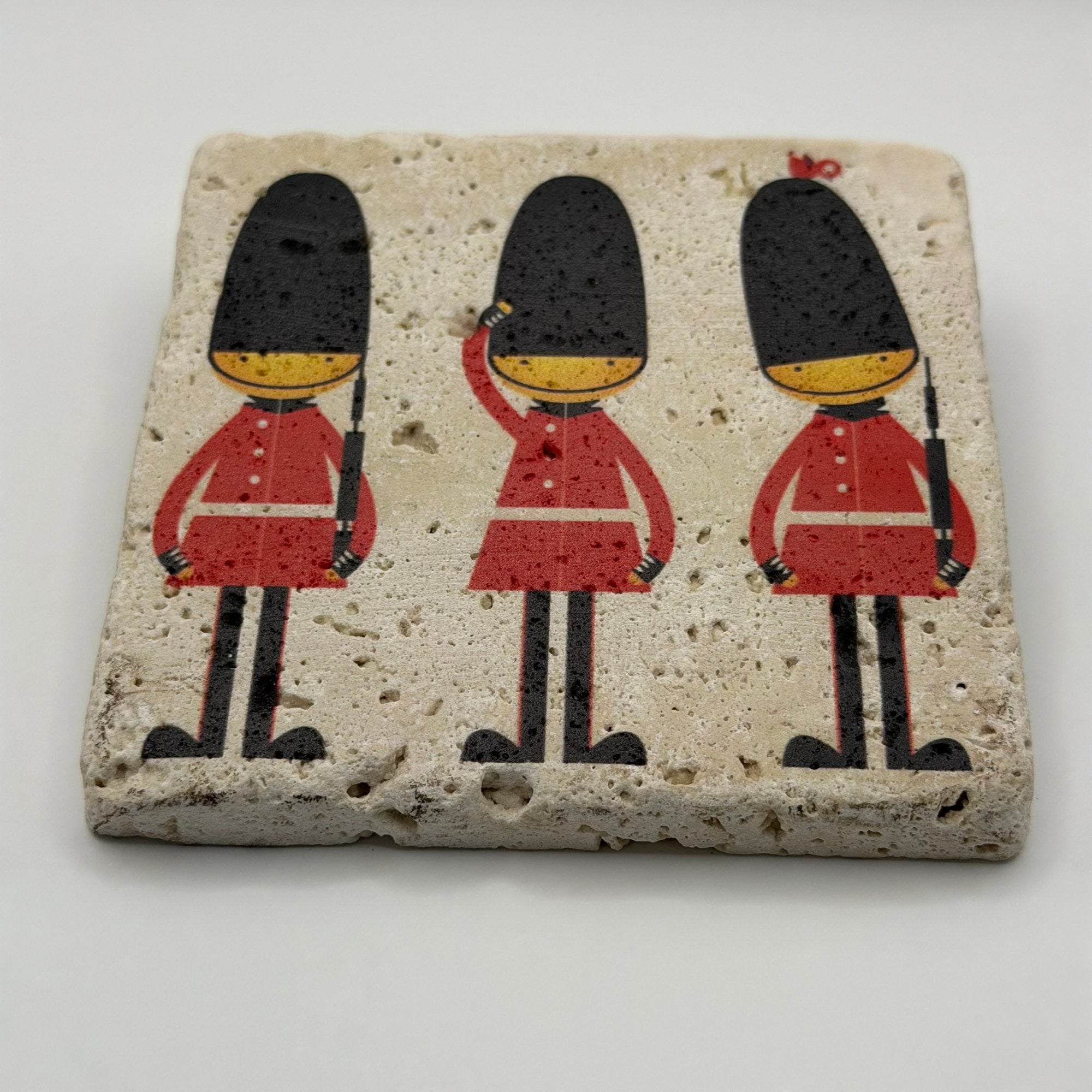 Three British Royal Guards printed on a natural travertine stone coaster