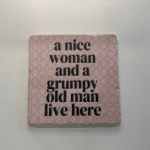 A Nice Woman And A Grumpy Old Man Live Here Natural Travertine Stone Hotpad artwork