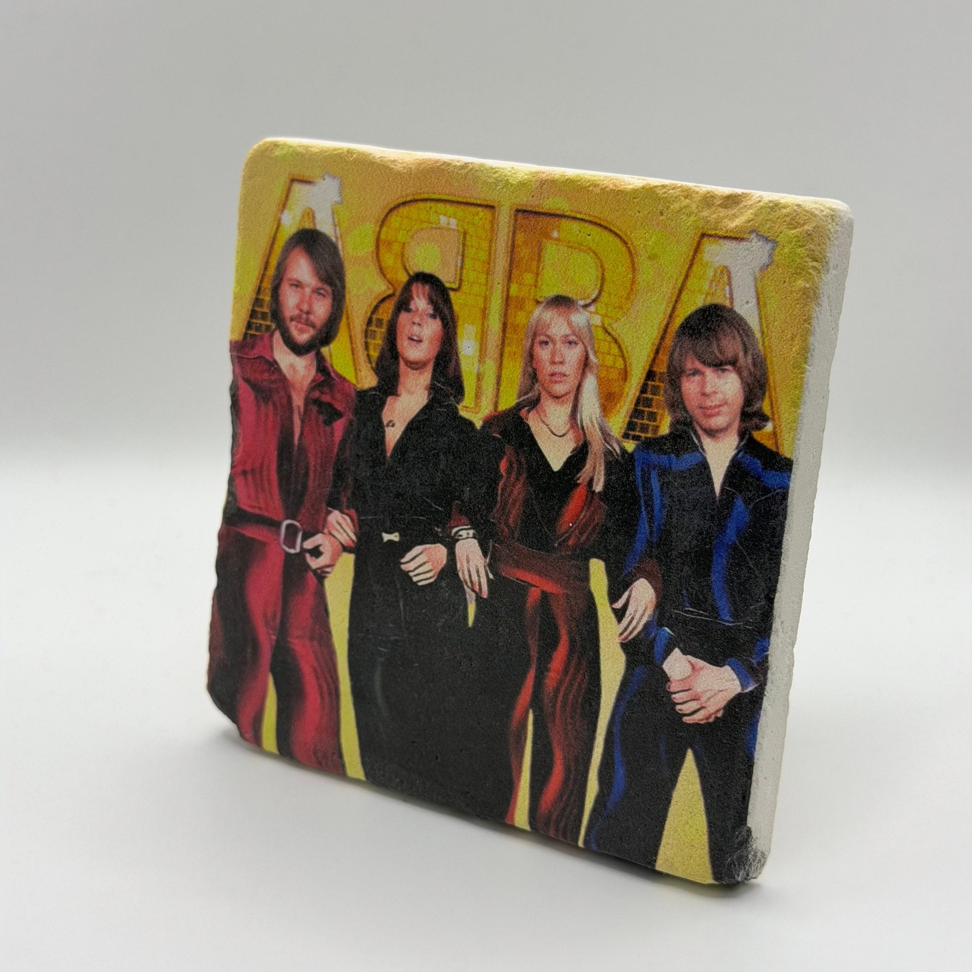 Abba logo and artwork printed on square travertine stone coaster