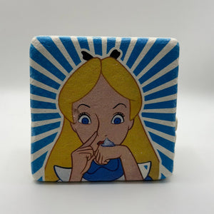 Whimsical Alice in Wonderland quote printed on square natural travertine stone coaster
