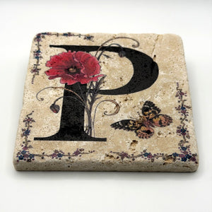 Alphabet letter P design printed on a natural stone coaster