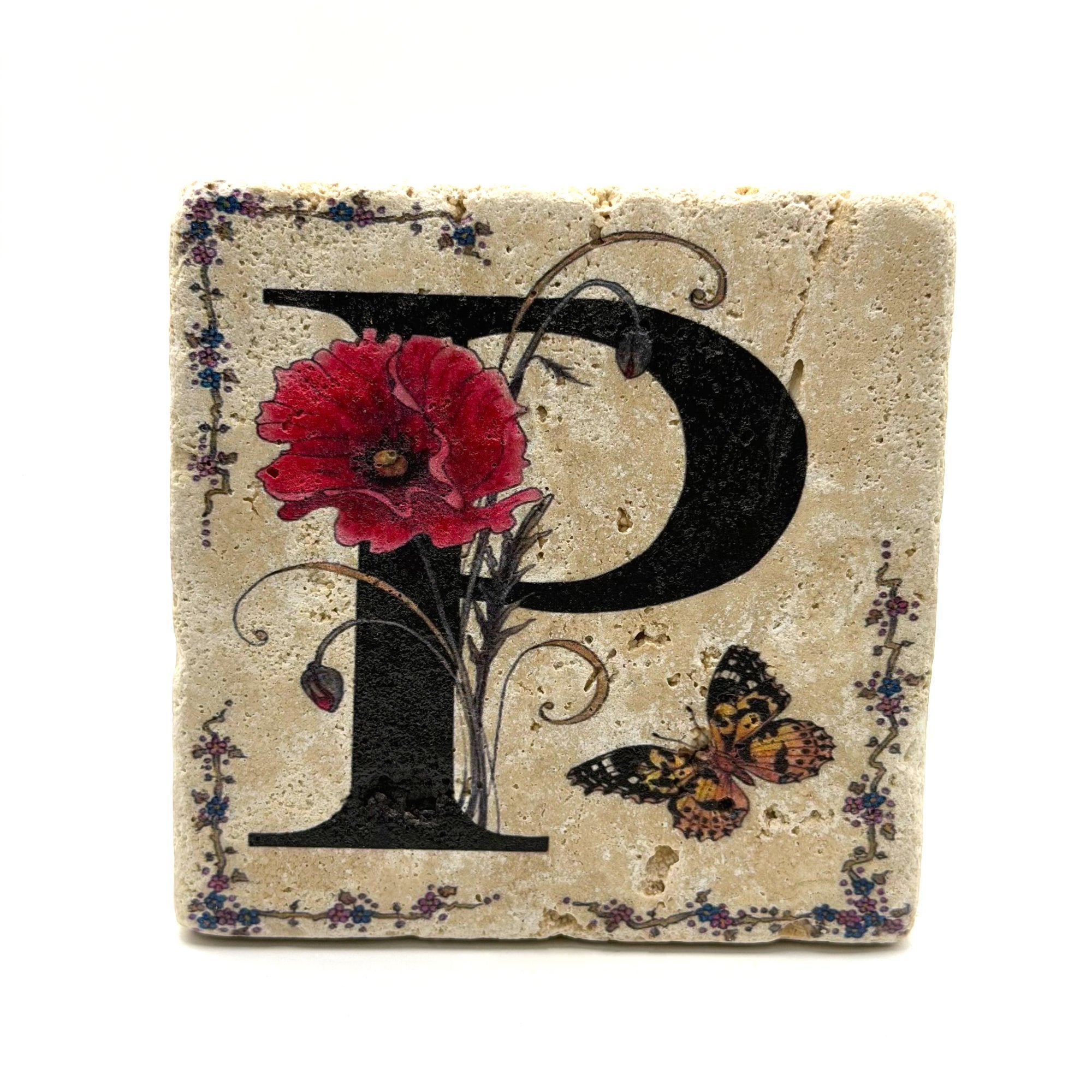 Alphabet letter P design printed on a natural stone coaster