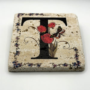 Alphabet letter T design printed on a natural stone coaster