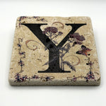 Alphabet letter Y design printed on a natural stone coaster