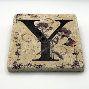 Alphabet letter Y design printed on a natural stone coaster