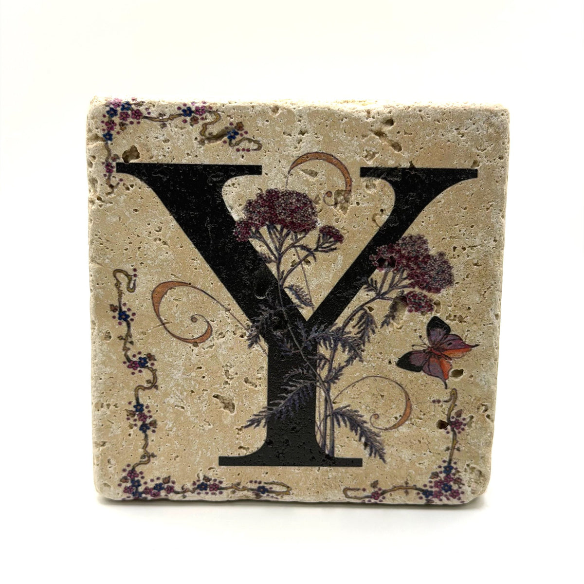 Alphabet letter Y design printed on a natural stone coaster