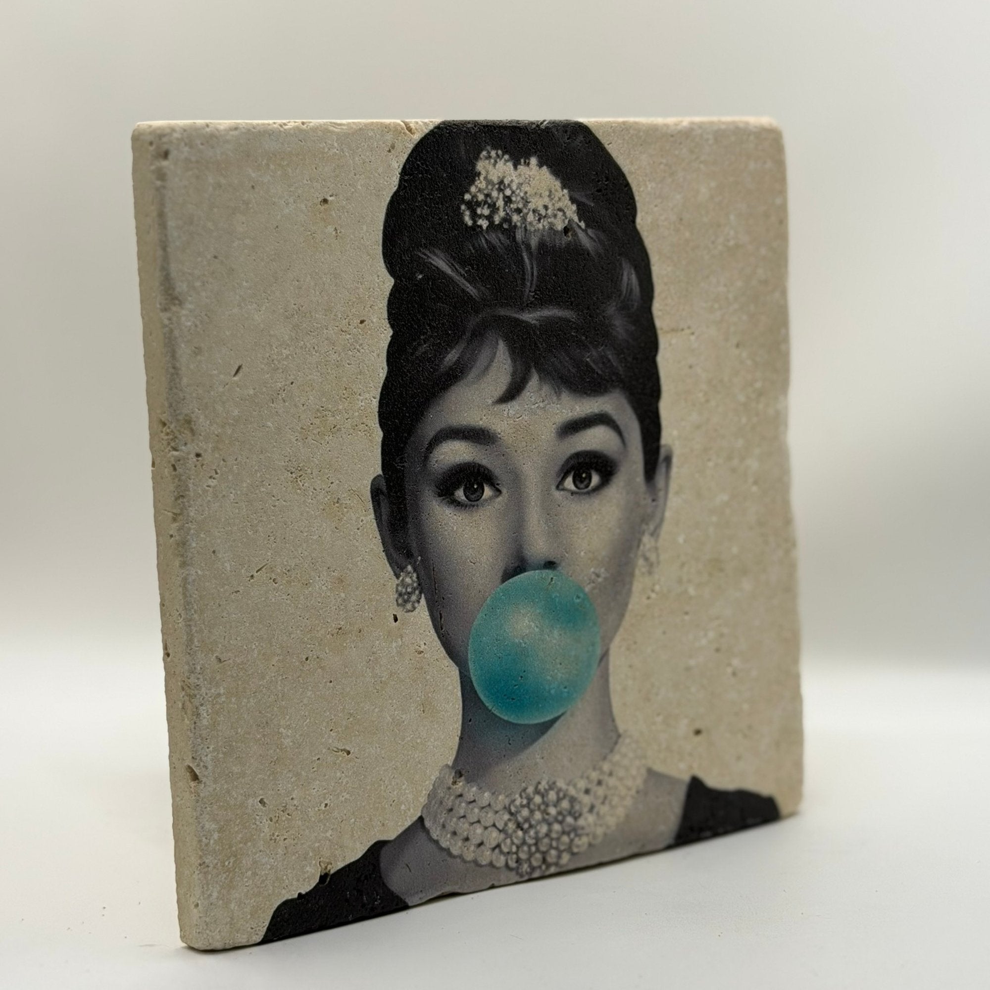 Audrey Hepburn Blue Bubble Natural Travertine Stone Hotpad artwork