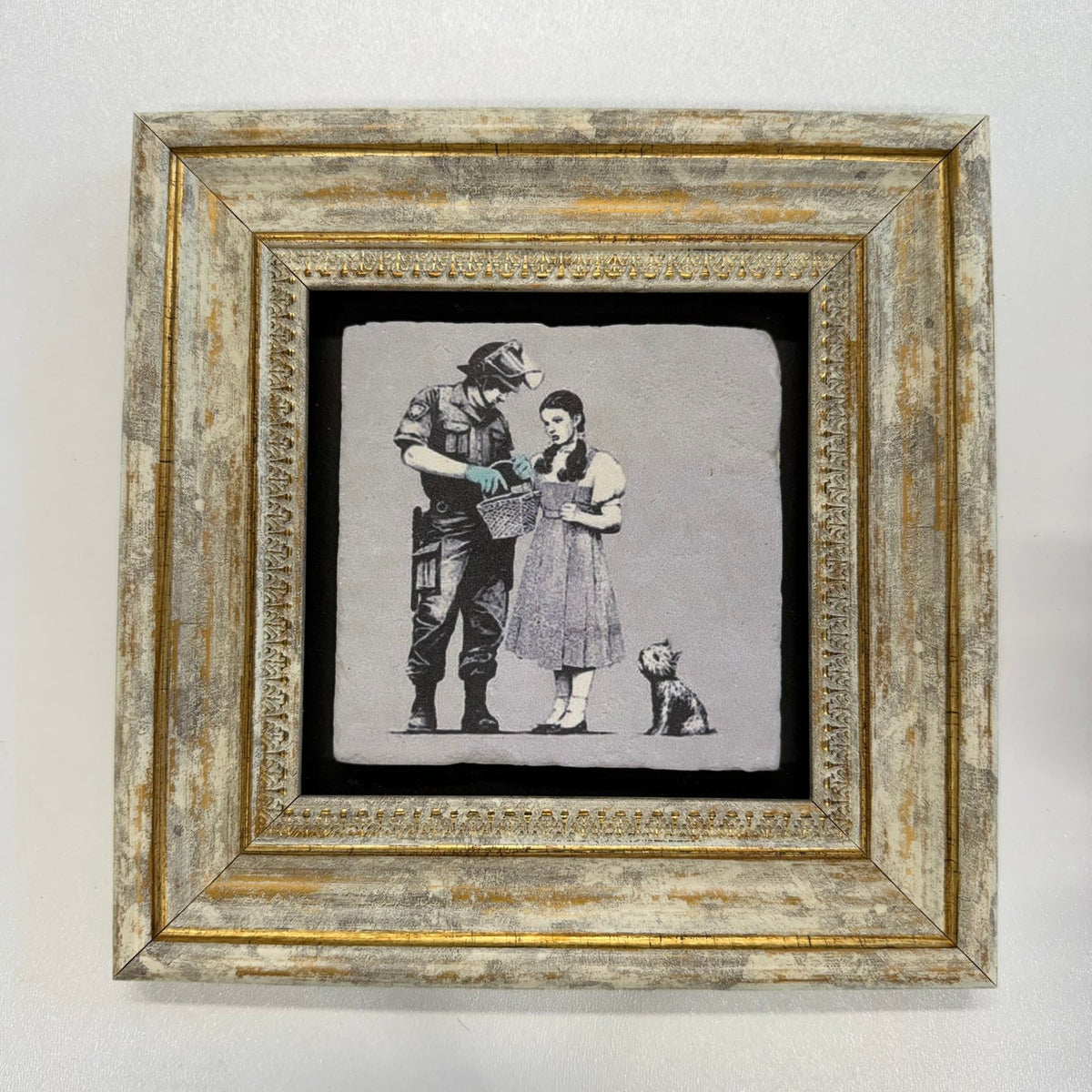 Variant Mapping v4 | banksy-dorothy-police-search-natural-stone-coaster | with Gold Frame | sha256:44d84b84807f
