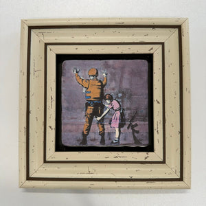 Variant Mapping v4 | banksy-girl-frisking-soldier-natural-stone-coaster | with White Frame | sha256:45f28a64e0a2