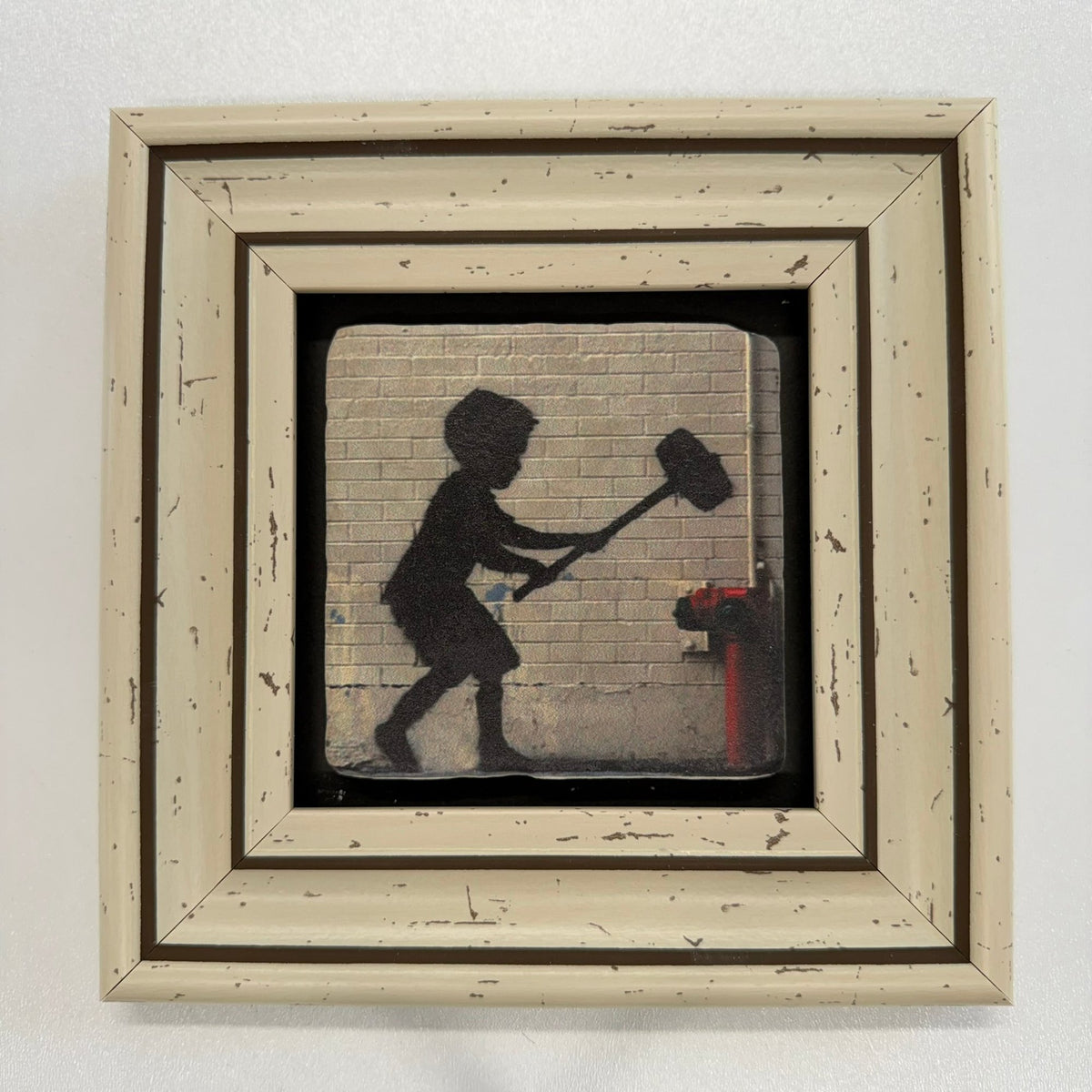 Variant Mapping v4 | banksy-hammer-boy-natural-stone-coaster | with White Frame | sha256:8ba57a312908