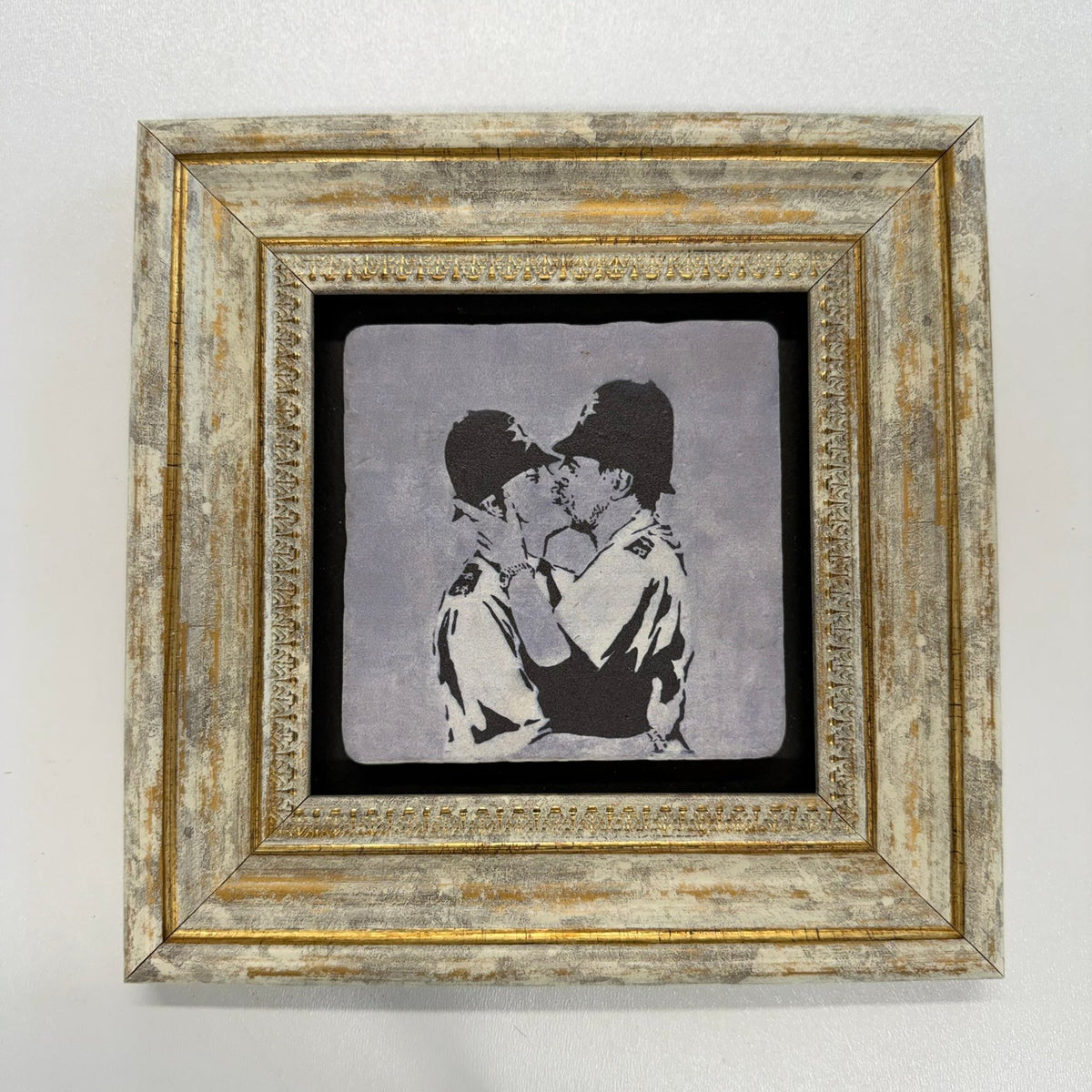 Variant Mapping v4 | banksy-kissing-coppers-natural-stone-coaster | with Gold Frame | sha256:5d34422bb914