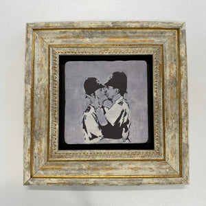 Variant Mapping v4 | banksy-kissing-coppers-natural-stone-coaster | with Gold Frame | sha256:5d34422bb914