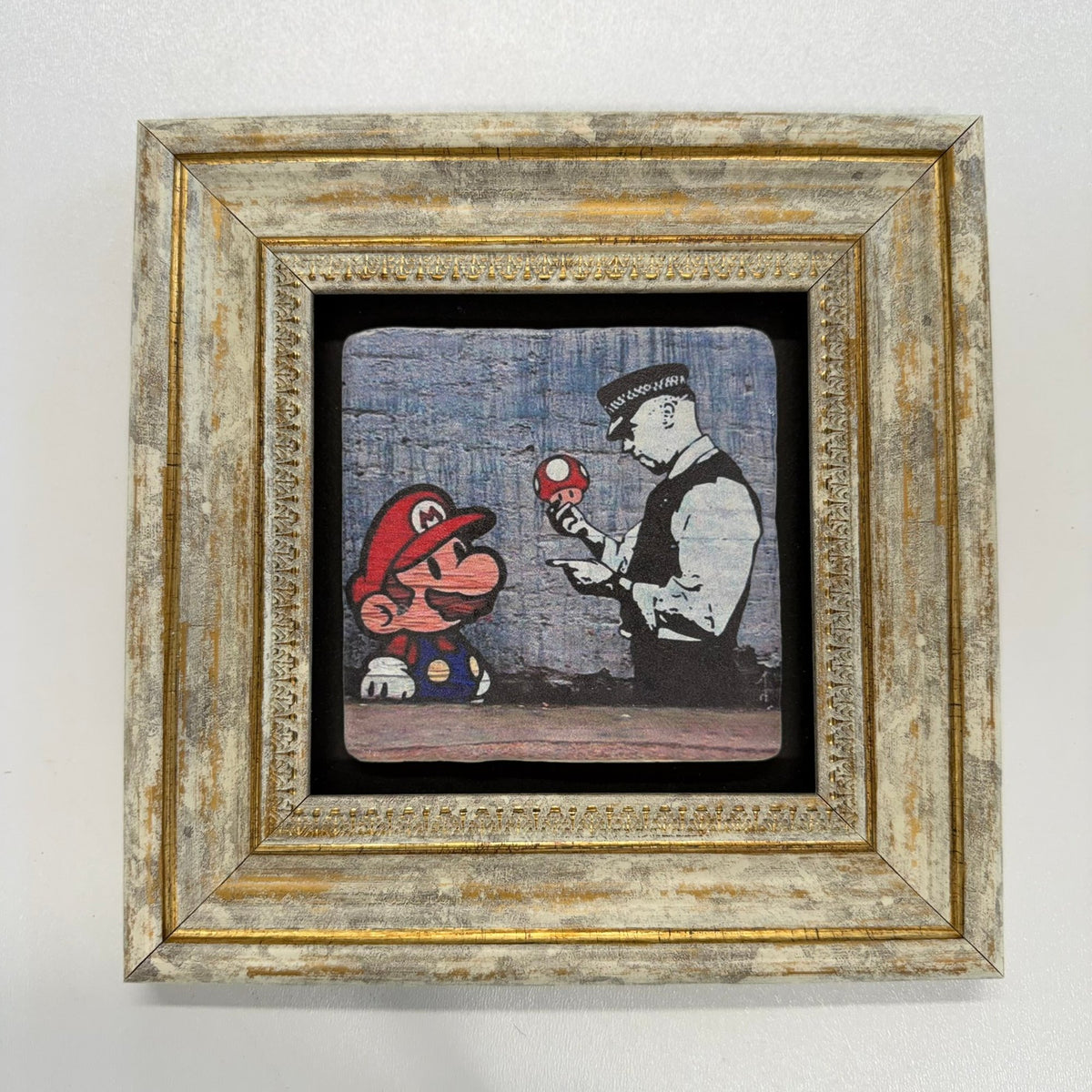 Variant Mapping v4 | banksy-mario-and-cop-natural-stone-coaster | with Gold Frame | sha256:91e7cc139b15