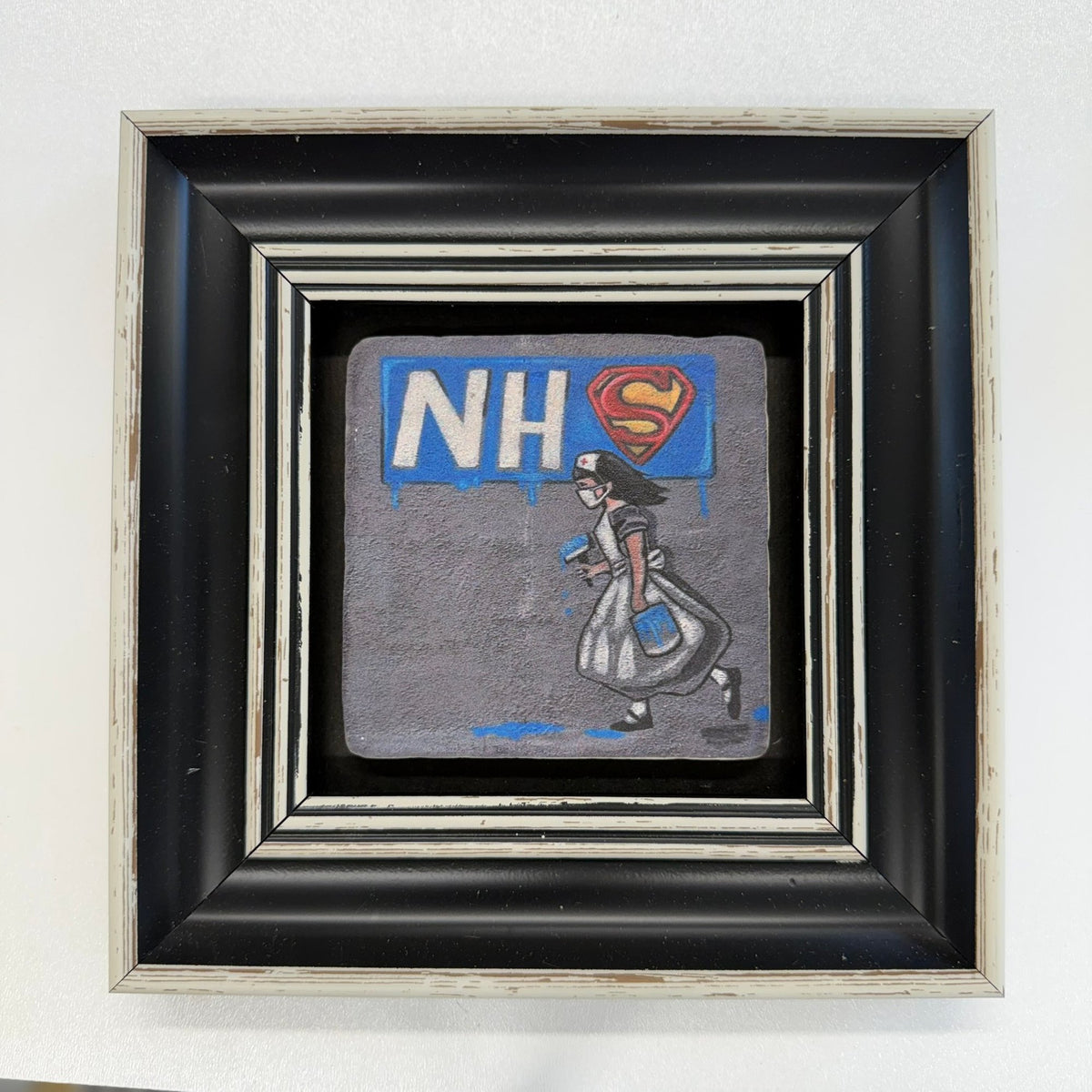 Variant Mapping v4 | banksy-nhs-natural-stone-coaster | with Black Frame | sha256:6c1df23a3199