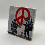Banksy artwork featuring peace soldiers printed on square travertine stone coaster