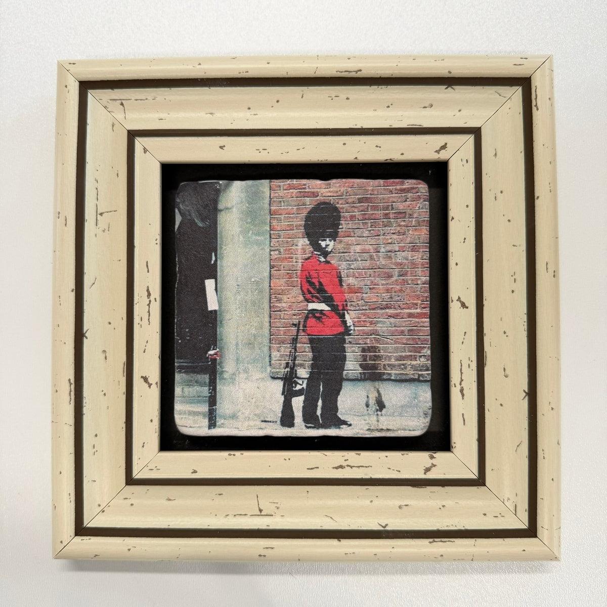 Variant Mapping v4 | banksy-pissing-guard-natural-stone-coaster | with White Frame | sha256:43db631e49cf