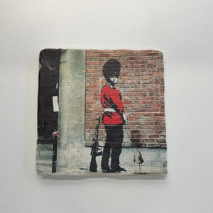Banksy Pissing Guard Street Art Natural Travertine Stone Hotpad artwork