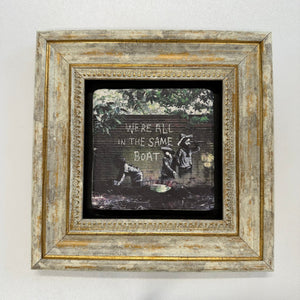 Variant Mapping v4 | banksy-we-re-all-human-stone-coaster | with Gold Frame | sha256:9d10d633f4ef