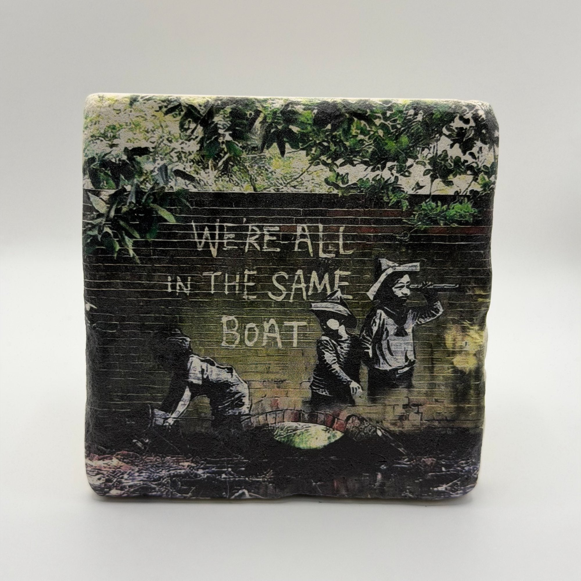 Banksy artwork printed on square travertine stone coaster
