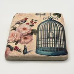 Bird Cage artwork printed on premium natural travertine stone coaster