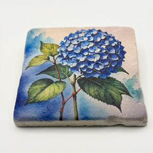 Vintage blue hydrangea artwork printed on square travertine stone coaster