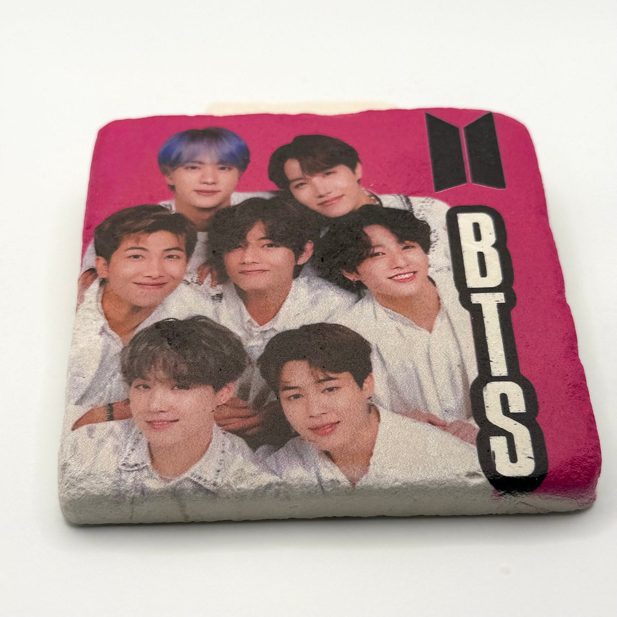 BTS artwork printed on square travertine stone coaster