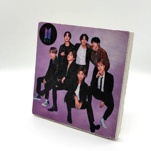 BTS artwork printed on square travertine stone coaster