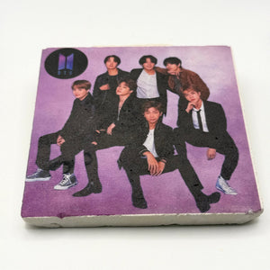 BTS artwork printed on square travertine stone coaster