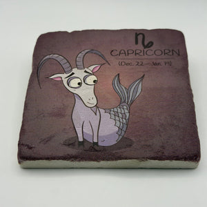 Capricorn astrological symbol printed on square travertine stone coaster
