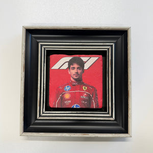 Variant Media V2 | carlos-sainz-natural-stone-ferrari-coaster | black | variant_main | sha256:87e5d6f67c71