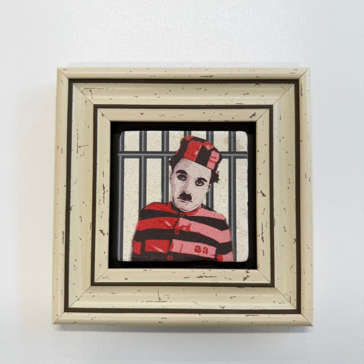 Variant Mapping v4 | charlie-chaplin-as-the-little-tramp-natural-stone-coaster | with White Frame | sha256:9aff079540cb