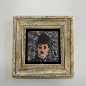Variant Mapping v4 | charlie-chaplin-classic-natural-stone-coaster | with Gold Frame | sha256:e48933d7fef5