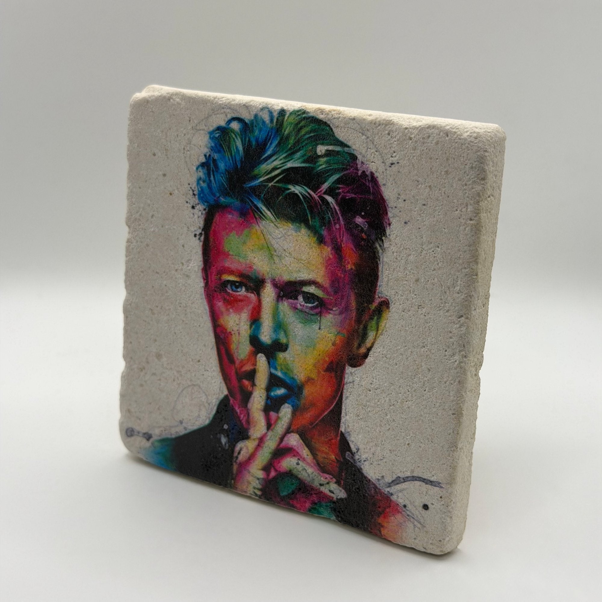 David Bowie artwork printed on square travertine stone coaster