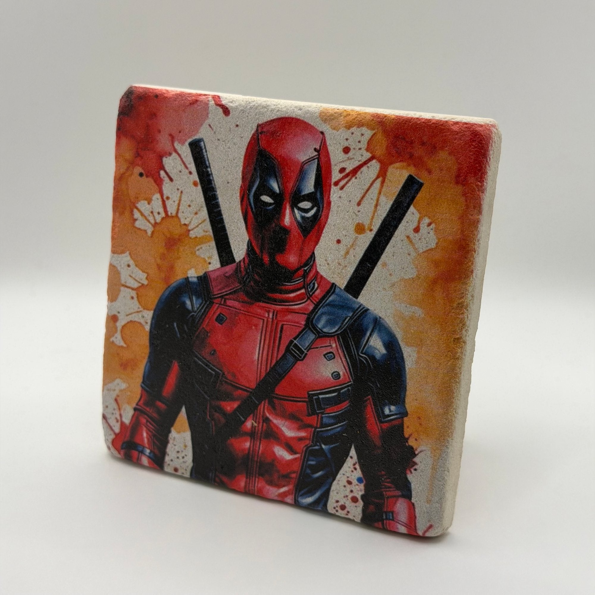 Deadpool logo or character artwork printed on square travertine stone coaster