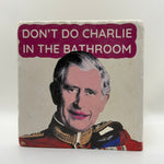 Dont Do Charlie In The Bathroom Natural Travertine Stone Hotpad artwork