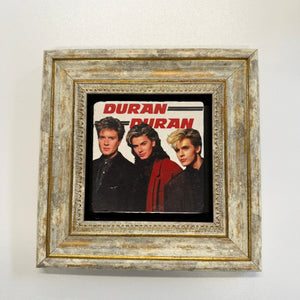Variant Mapping v4 | duran-duran-natural-stone-coaster | with Gold Frame | sha256:9e78b40ac9e8