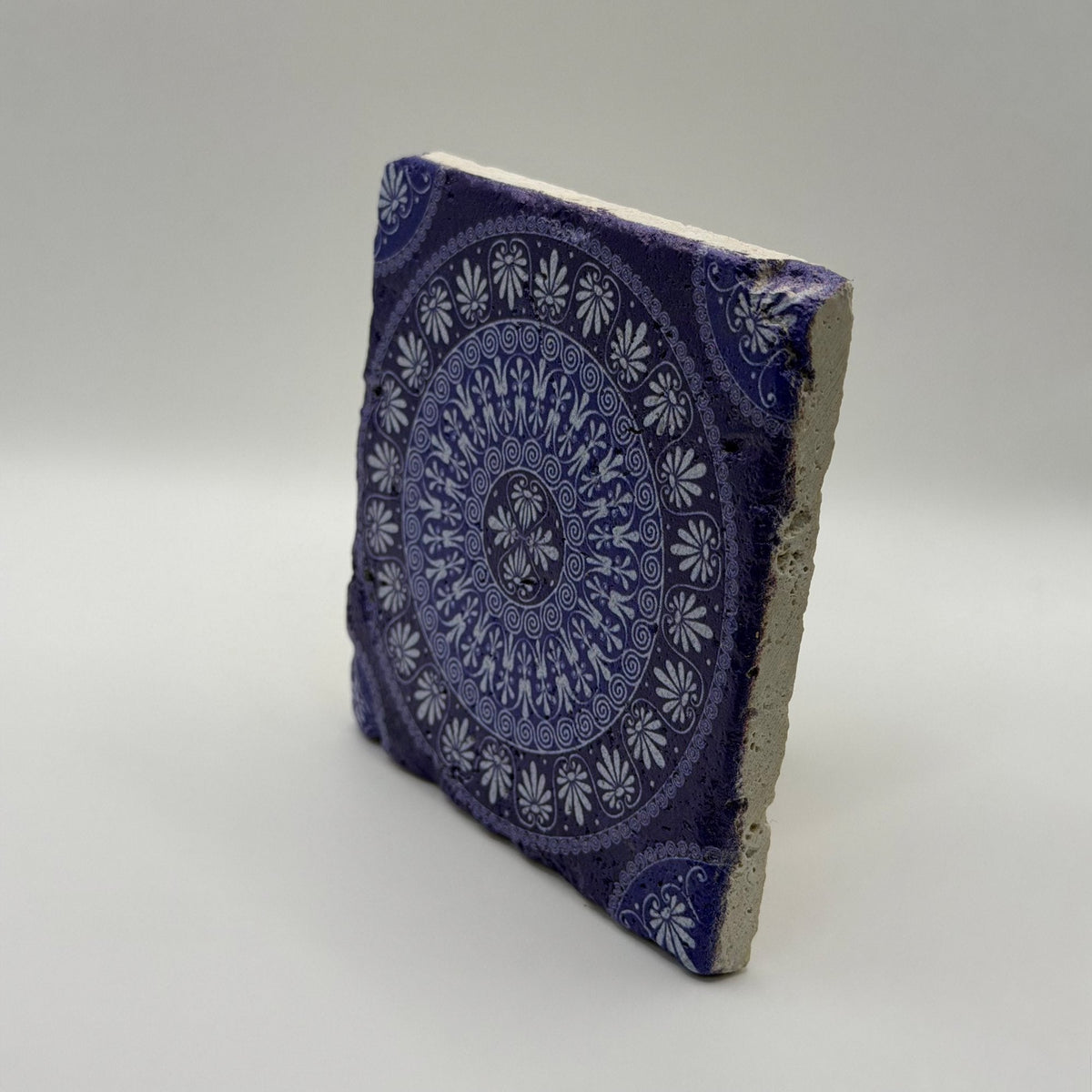 Ethnics pattern number 01 printed on a natural travertine stone coaster