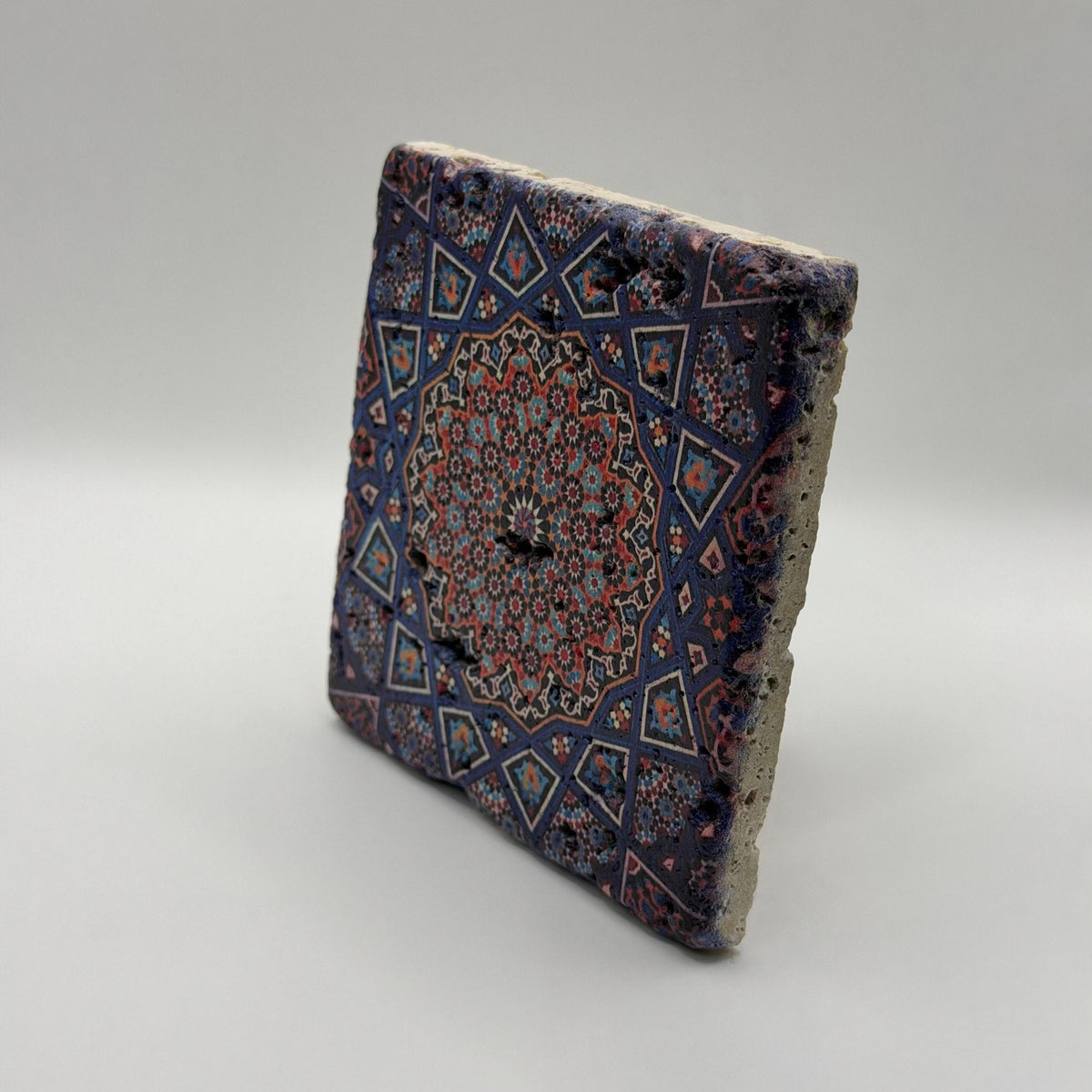 Ethnics pattern number 02 printed on a natural travertine stone coaster